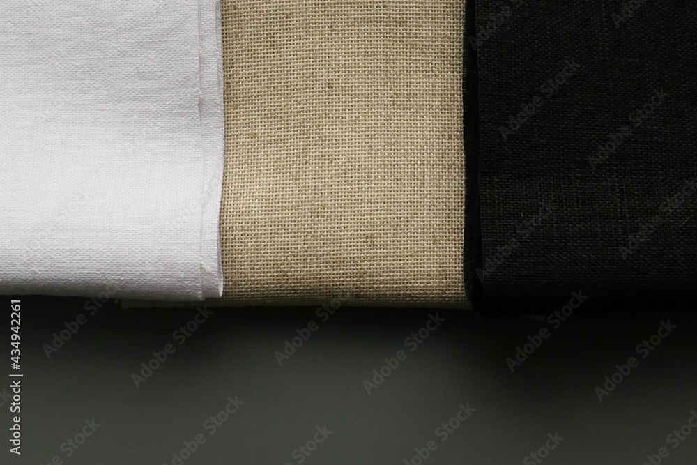 Obraz premium rolls of linen fabric of different colors