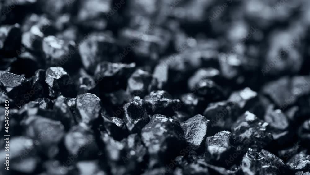 Stone ore close-up. Black stones grunge background. Stone ore close-up. Black stones grunge background.