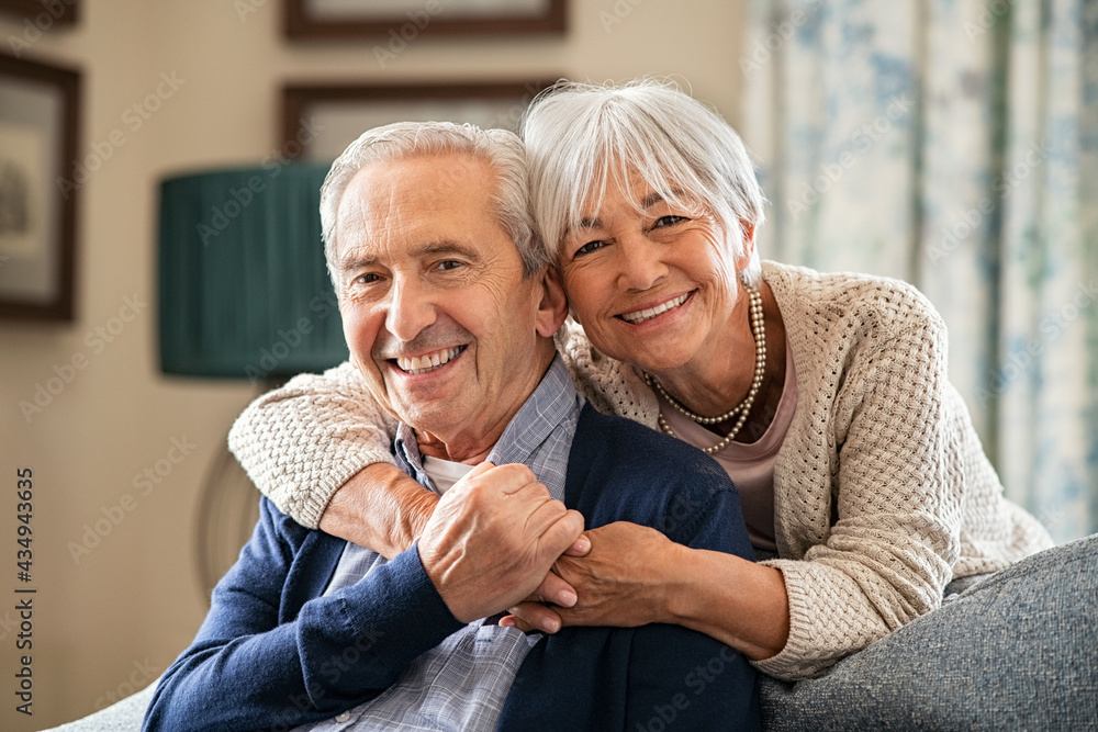 © Rido - Happy senior couple embracing at home with love © Rido - Happy senior couple embracing at home with love