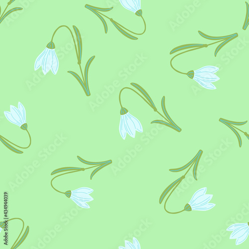 Light green colored random harebell flowers shapes. Seamless pattern in doodle hand drawn stylistic.