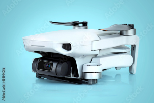 Gray mini quadcopter on a blue background 