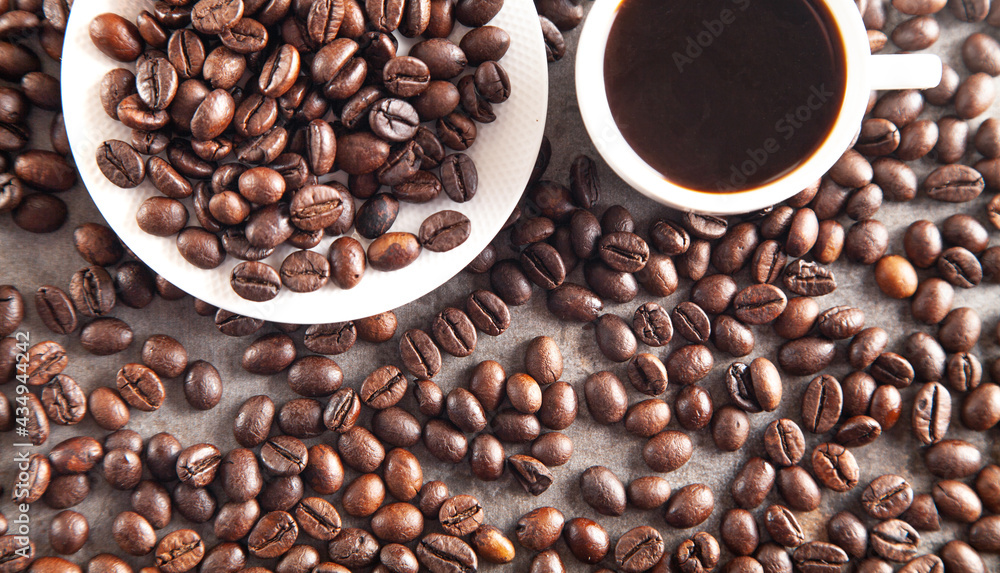 Fototapeta premium Cup of coffee on coffee beans.