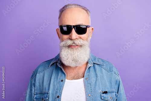 Photo of handsome aged man happy positive smile wear sunglass isolated over violet color background