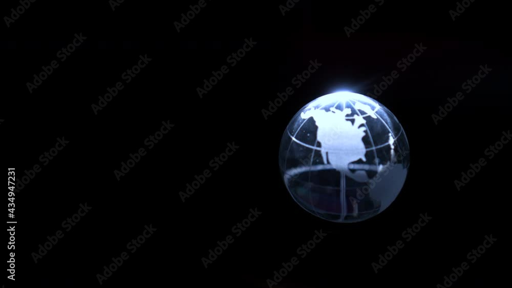 Crytal globe world map floating in the dark with copy space focus on America continent Crytal globe world map floating in the dark with copy space focus on America continent