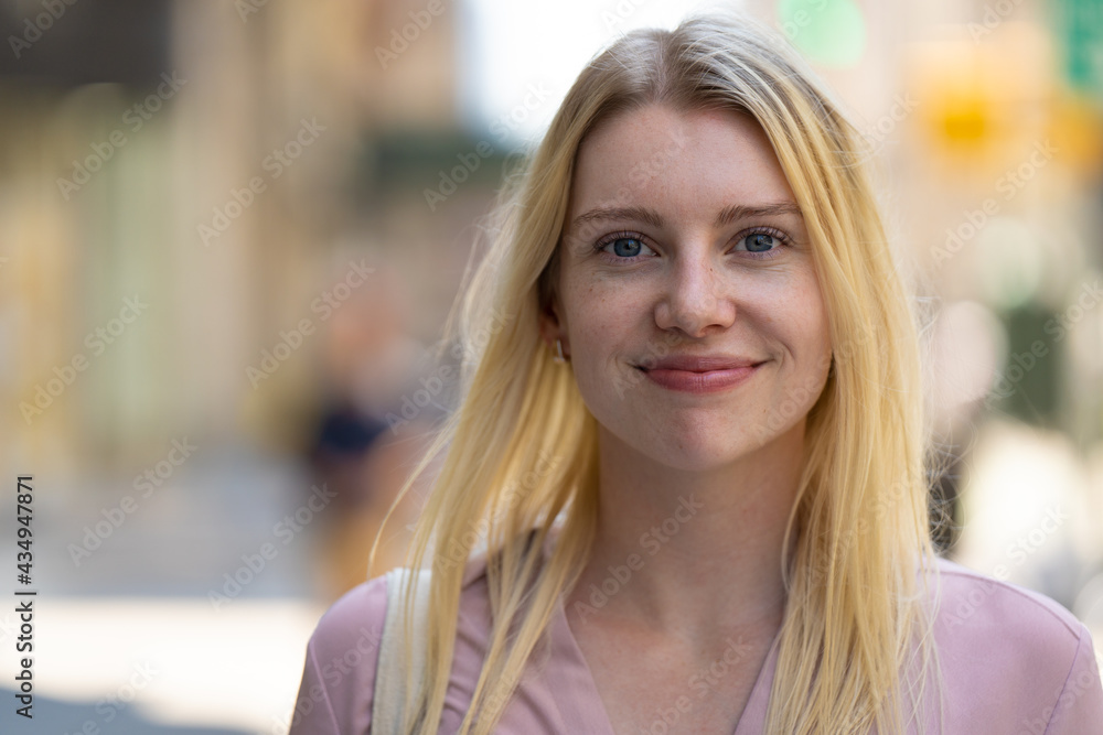 Young caucasian woman in city smile happy face portrait Young caucasian woman in city smile happy face portrait