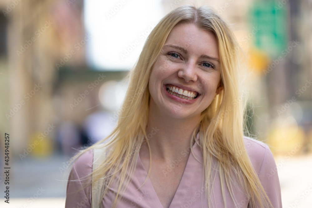 Young caucasian woman in city smile happy face portrait Young caucasian woman in city smile happy face portrait