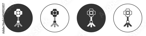 Black Studio light bulb in softbox icon isolated on white background. Shadow reflection design. Circle button. Vector