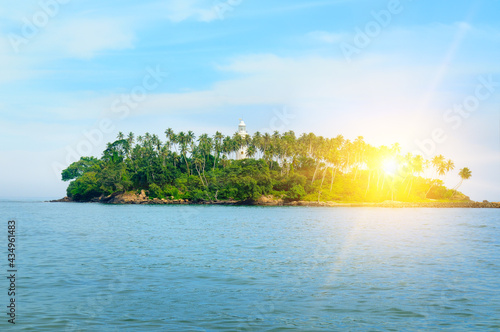 Barberyn Island and Lighthouse  turquoise ocean and sunset. Sri Lanka .