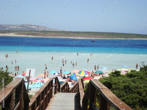 wooden bridge on the beach la pelosa