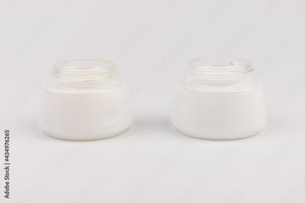 Beauty Cream Texture Close Up. Cosmetic Skincare Product In Jar On White Background. High Quality Beauty Cream Texture Close Up. Cosmetic Skincare Product In Jar On White Background. High Quality
