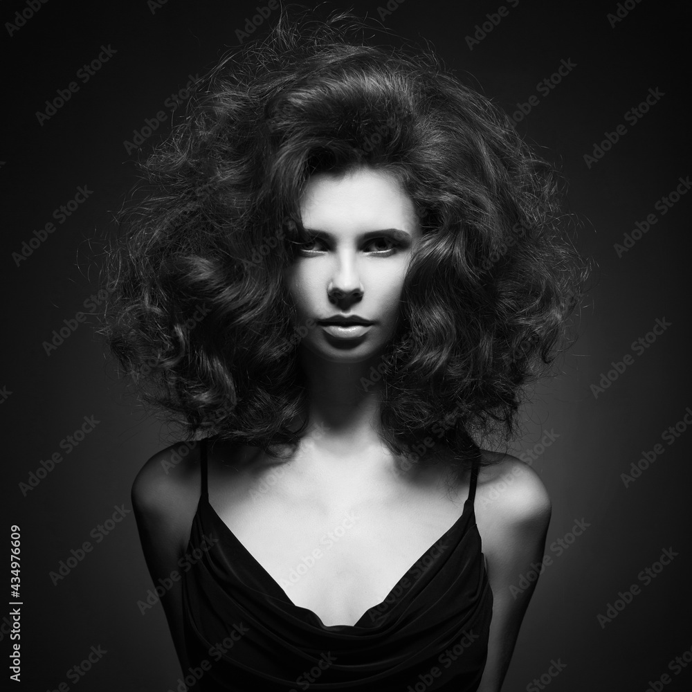 Fototapeta premium Beautiful woman with volume wavy hair