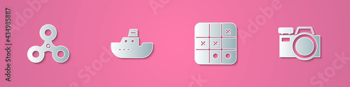Set paper cut Fidget spinner, Toy boat, Tic tac toe game and Photo camera icon. Paper art style. Vector