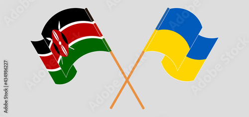 Crossed and waving flags of Kenya and Ukraine