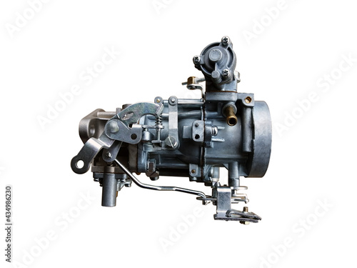 Car carburetor for internal combustion engine for mixing air with a fine spray of liquid fuel isolated white background. New spare parts.
