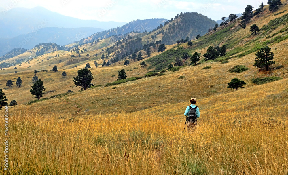 Woman hiking on the Hogback Ridge Trail, Boulder, Colorado