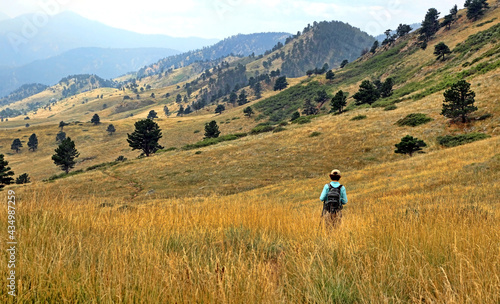 Woman hiking on the Hogback Ridge Trail, Boulder, Colorado © Jim Glab