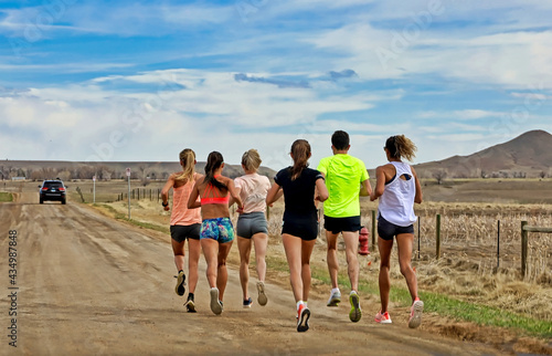 Group of runners on a country road in Colorado