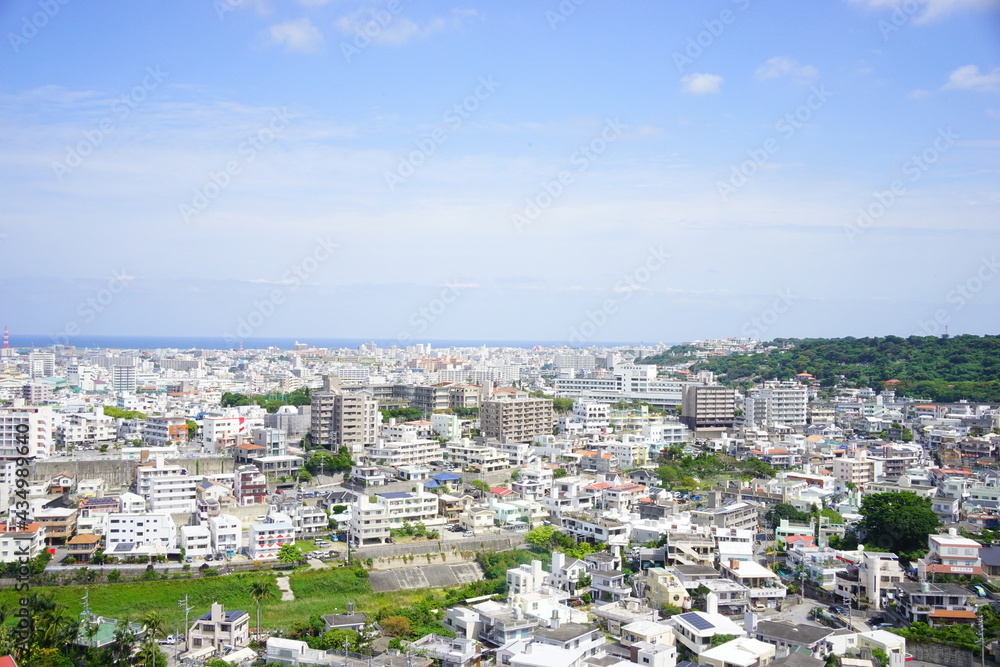 Aerial view of Naha city and seashore in Okinawa, japan - 日本 沖縄県 那覇市 街並み 海