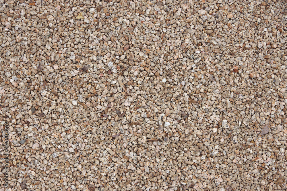 Light brown gravel stones in a high angle full frame close-up view Light brown gravel stones in a high angle full frame close-up view