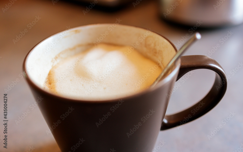 Mug with coffee and milk foam Mug with coffee and milk foam