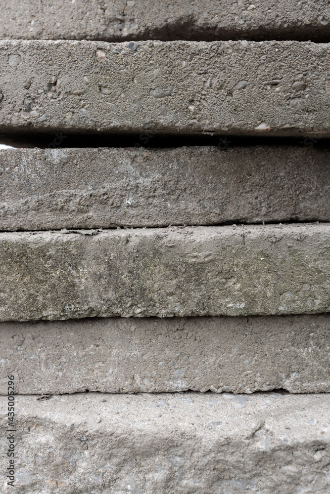 Sidewalk stone slabs stacked on top of each other Sidewalk stone slabs stacked on top of each other
