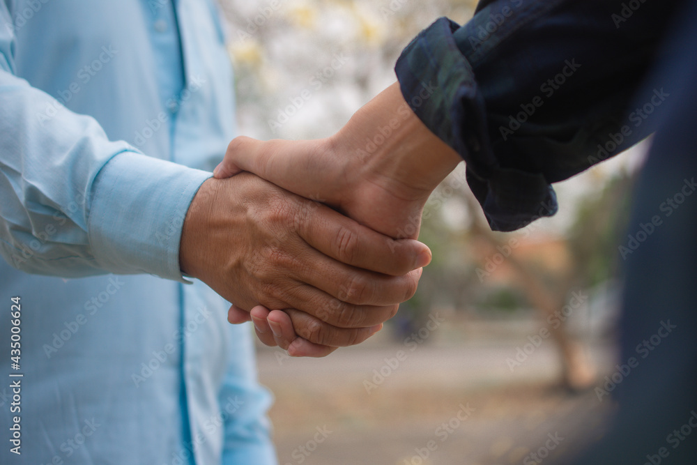 Fototapeta premium Friends shake hand teamwork partnership , Hand shake concept