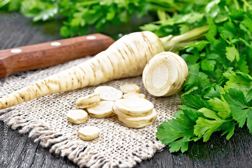 Parsley root chopped on dark board