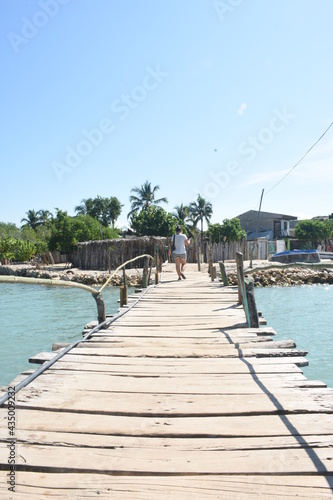 wooden bridge over the sea