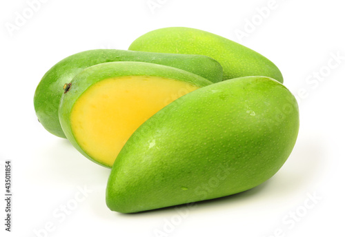 fresh green mangoes on white background.