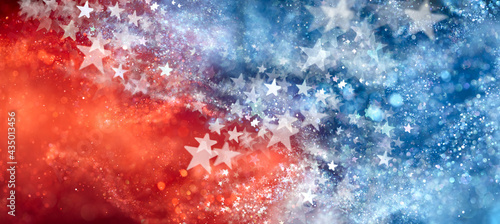 Red, white, and blue abstract background with sparkling stars. USA background wallpaper for 4th of July, Memorial Day, Veteran's Day, or other patriotic celebration. photo