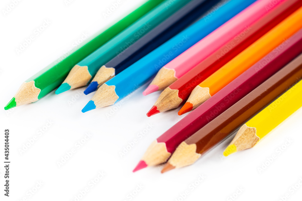 multicolored pencils isolated on white, many different drawing supplies multicolored pencils isolated on white, many different drawing supplies