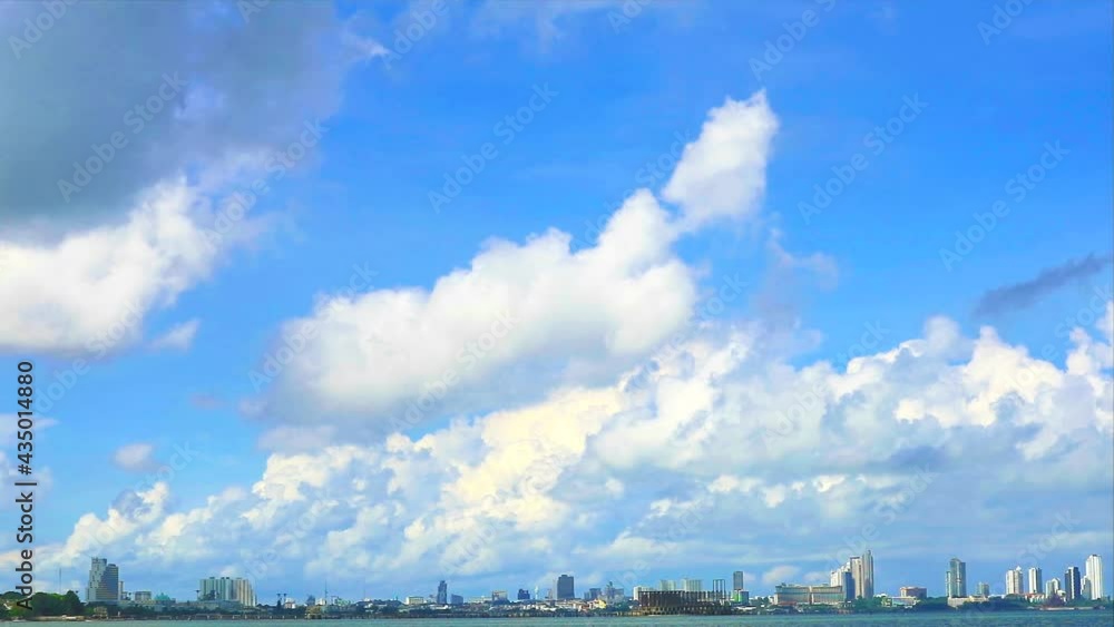 heap beautiful white cloud blue sky huge rollong over the sea and city in the rainy season time lapse heap beautiful white cloud blue sky huge rollong over the sea and city in the rainy season time lapse