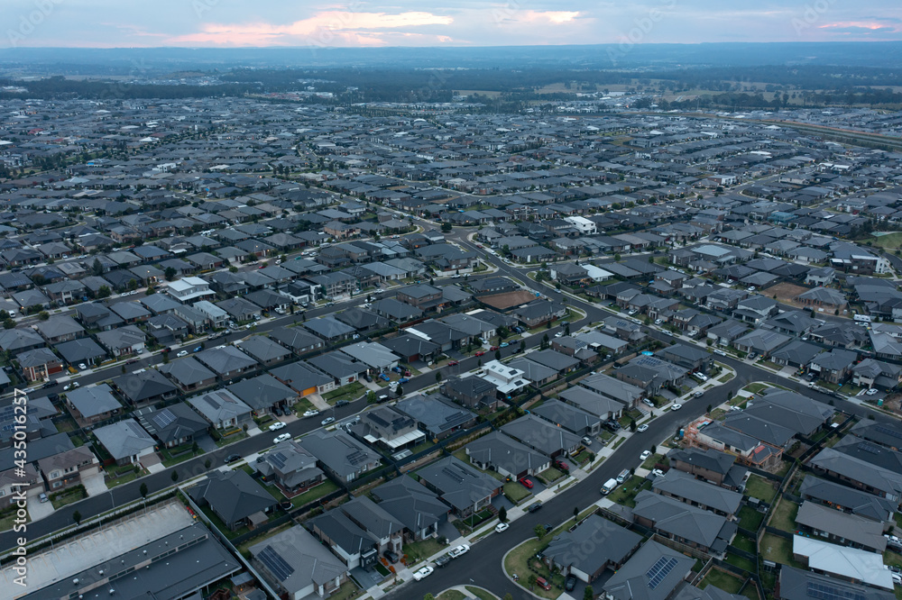 Fototapeta premium Aerial view of new housing development in the rapidly growing south west Sydney suburb of Oran Park, Australia.