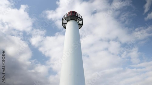 Lighthouse in the sky photo