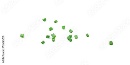 chopped green onions on white background photo