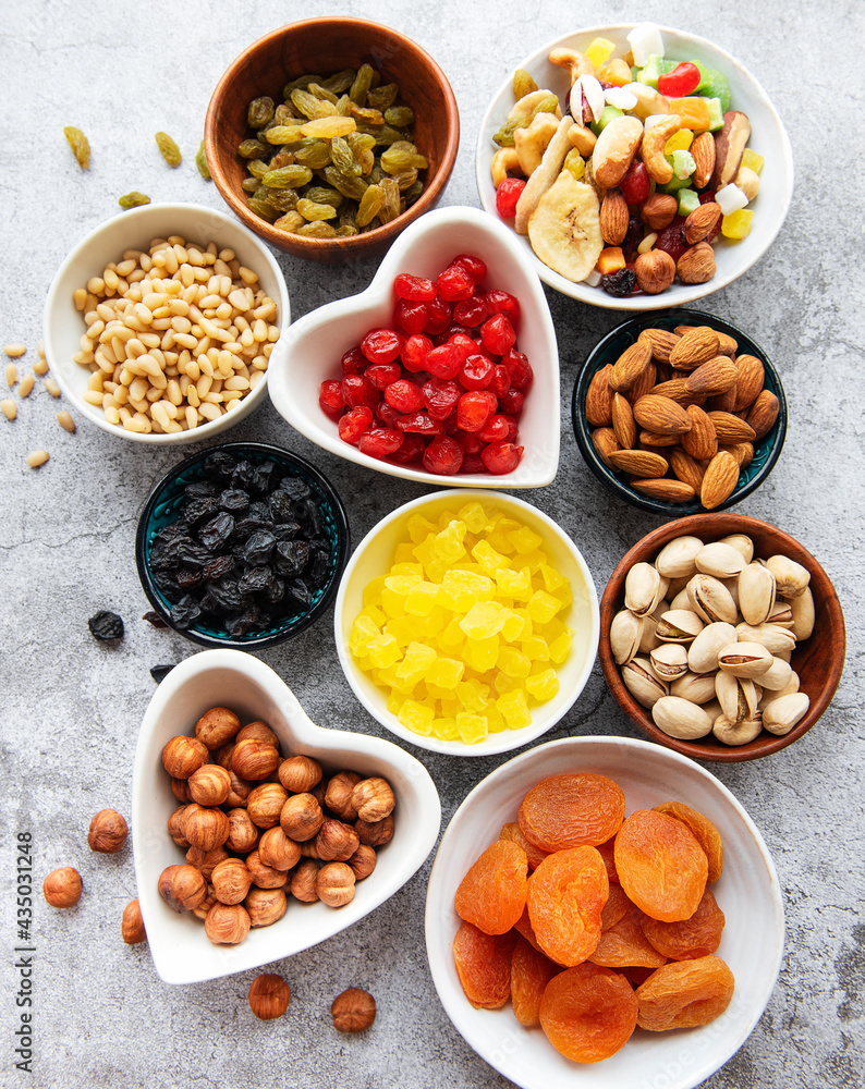 Bowls with various dried fruits and nuts Bowls with various dried fruits and nuts