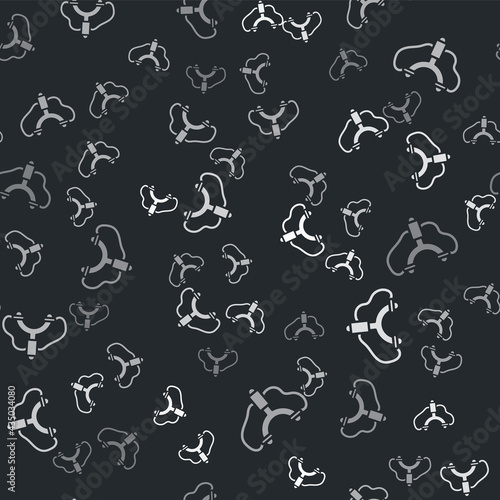 Grey Slingshot icon isolated seamless pattern on black background. Vector