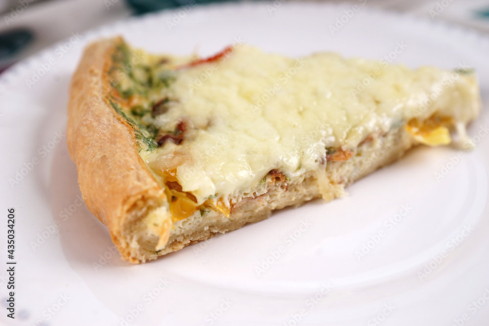 Kish. Homemade pie with scrambled eggs, vegetables and cheese. Kish. Homemade pie with scrambled eggs, vegetables and cheese.