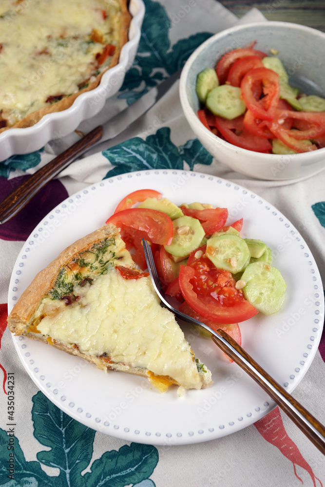Kish. Homemade pie with scrambled eggs, vegetables and cheese. Kish. Homemade pie with scrambled eggs, vegetables and cheese.