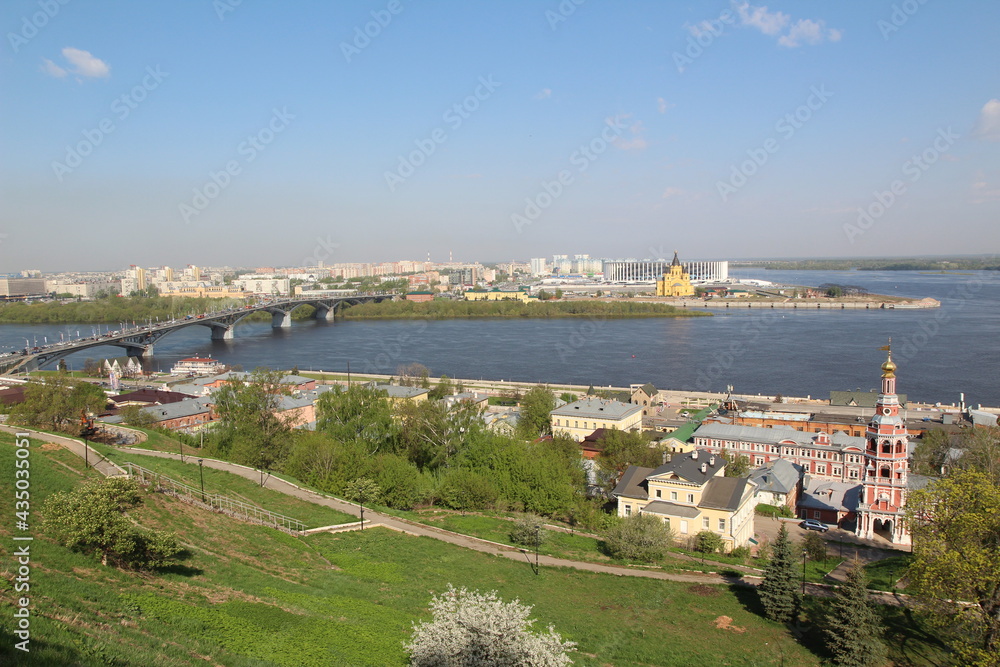 Panorama of Nizhny Novgorod and the confluence of the Oka river and Volga river. Nizhny Novgorod Stadium, Alexander Nevsky Cathedral and Christmas Church.