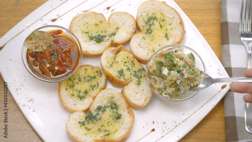 Bread toasts with pickled peppers and aubergine, Mediterranean Bread toasts with pickled peppers and aubergine, Mediterranean