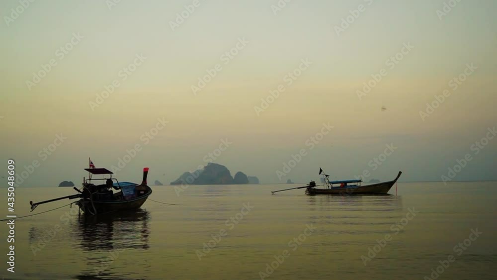 long-tail boat at Poda beach in Thailand long-tail boat at Poda beach in Thailand