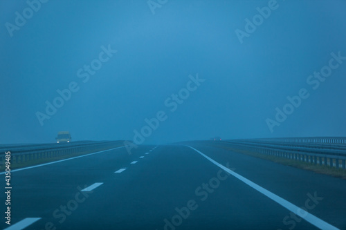 empty highway in the mist