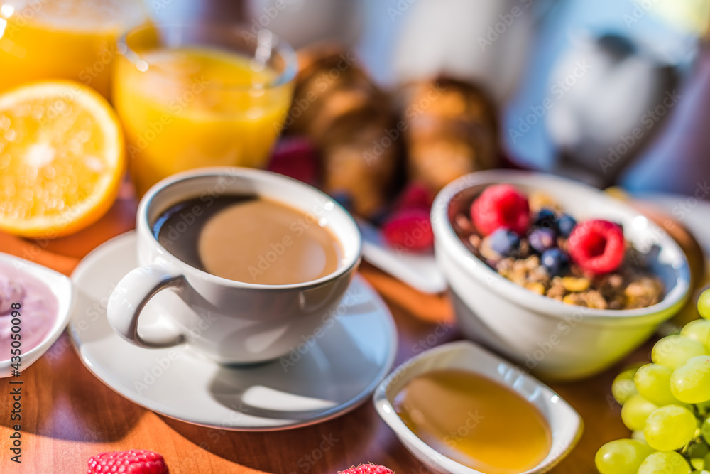 Breakfast served with coffee, orange juice, croissants, cereals Breakfast served with coffee, orange juice, croissants, cereals