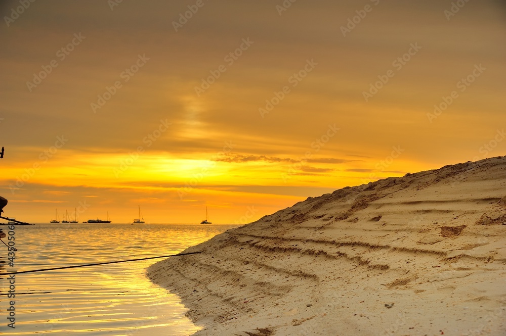 Sunset on the beach at Lipe Island , Satun Thailand