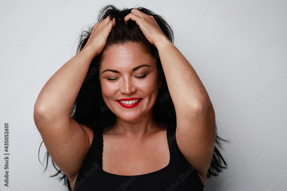 Pretty thoughtful woman with happy expression. Close-up portrait. Pretty thoughtful woman with happy expression. Close-up portrait.