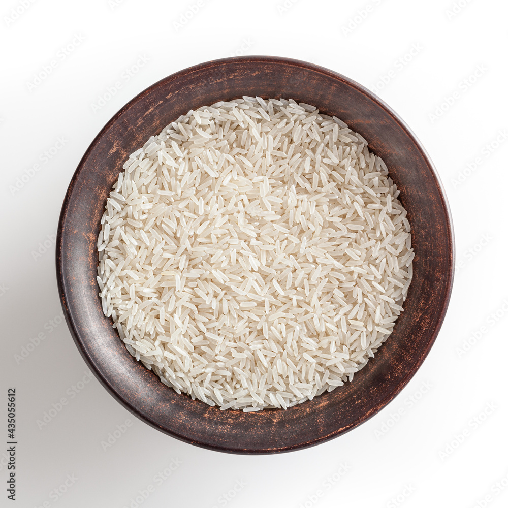 Uncooked jasmine rice in ceramic bowl isolated on white background Uncooked jasmine rice in ceramic bowl isolated on white background
