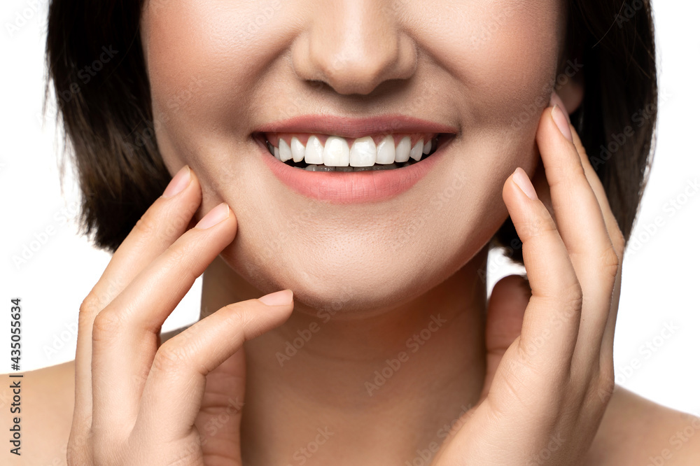 Beautiful female smile with a white teeth Beautiful female smile with a white teeth