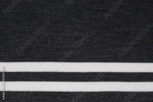 Dark grey striped rib knit fabric texture