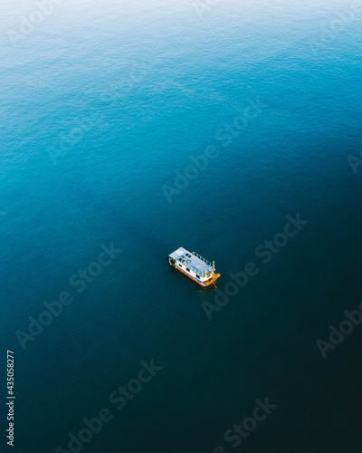 Aerial view of a houseboat on the Burrum River in Queensland, Australia